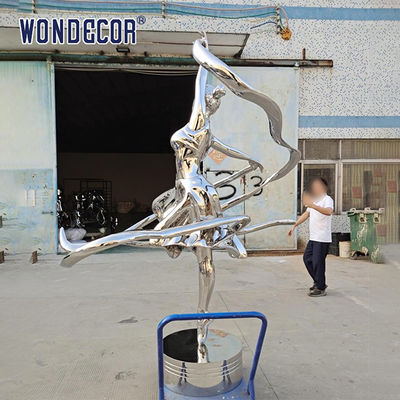 Large stainless steel character shaped outdoor sculpture in the park