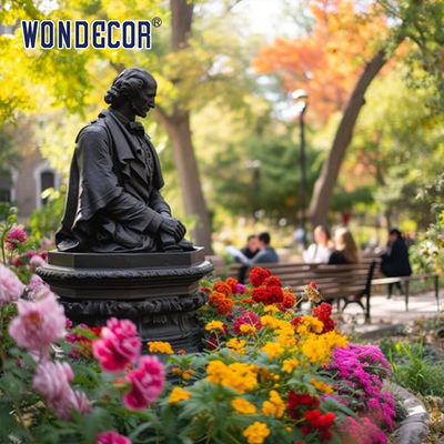 Bronze figure sculpture in the central square of the city garden